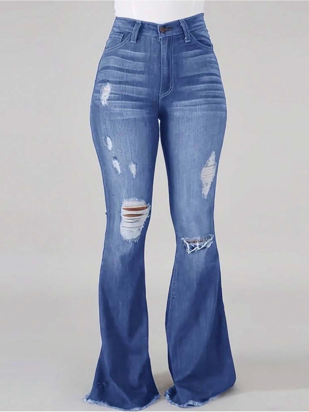 Mid-Rise Distressed Flare Jeans in Medium Blue